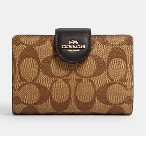 New Coach signature black and tan wallet